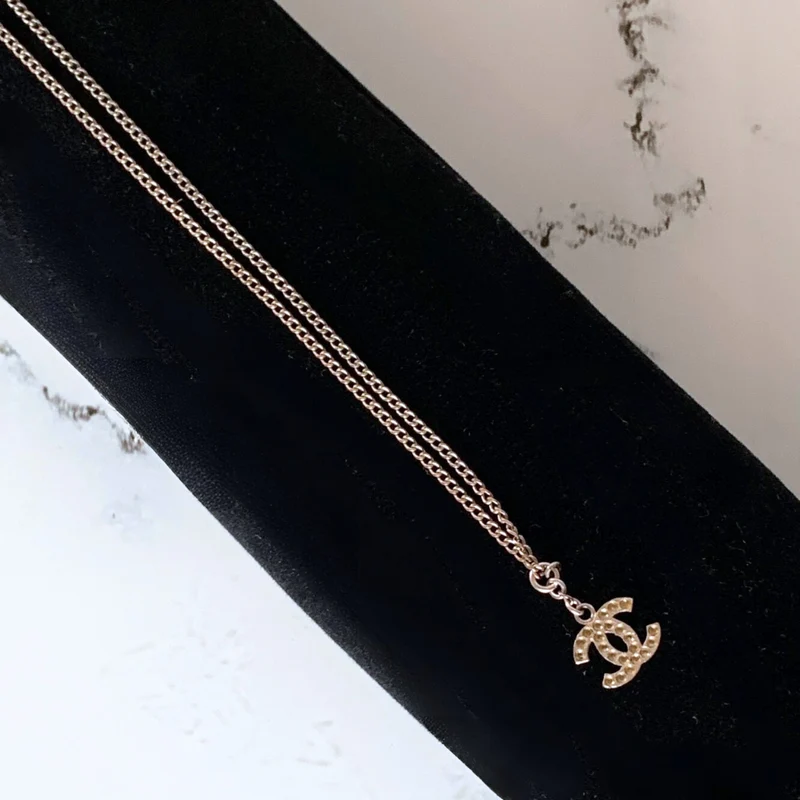 Chanel CC Halskette Silber Plissee