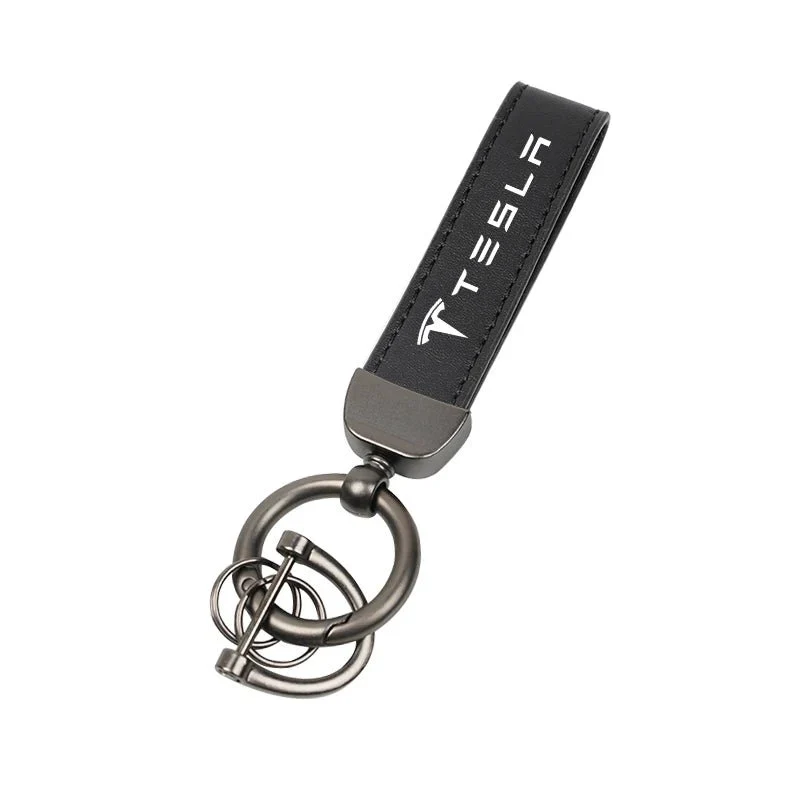 Schlüsselanhänger aus Wildleder mit roten Ziernähten und Tesla-Logo – Tesla-Geschenkserie